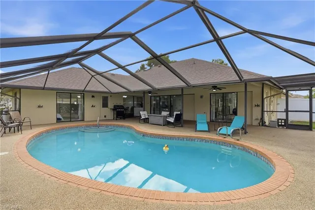 a view of indoor pool and sitting area