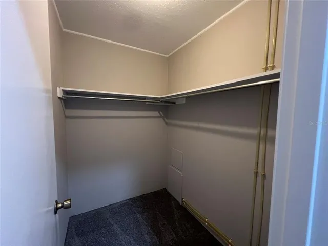 a bathroom with a sink vanity and mirror