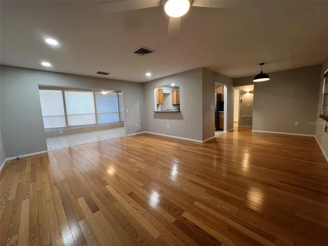 a view of an empty room and window