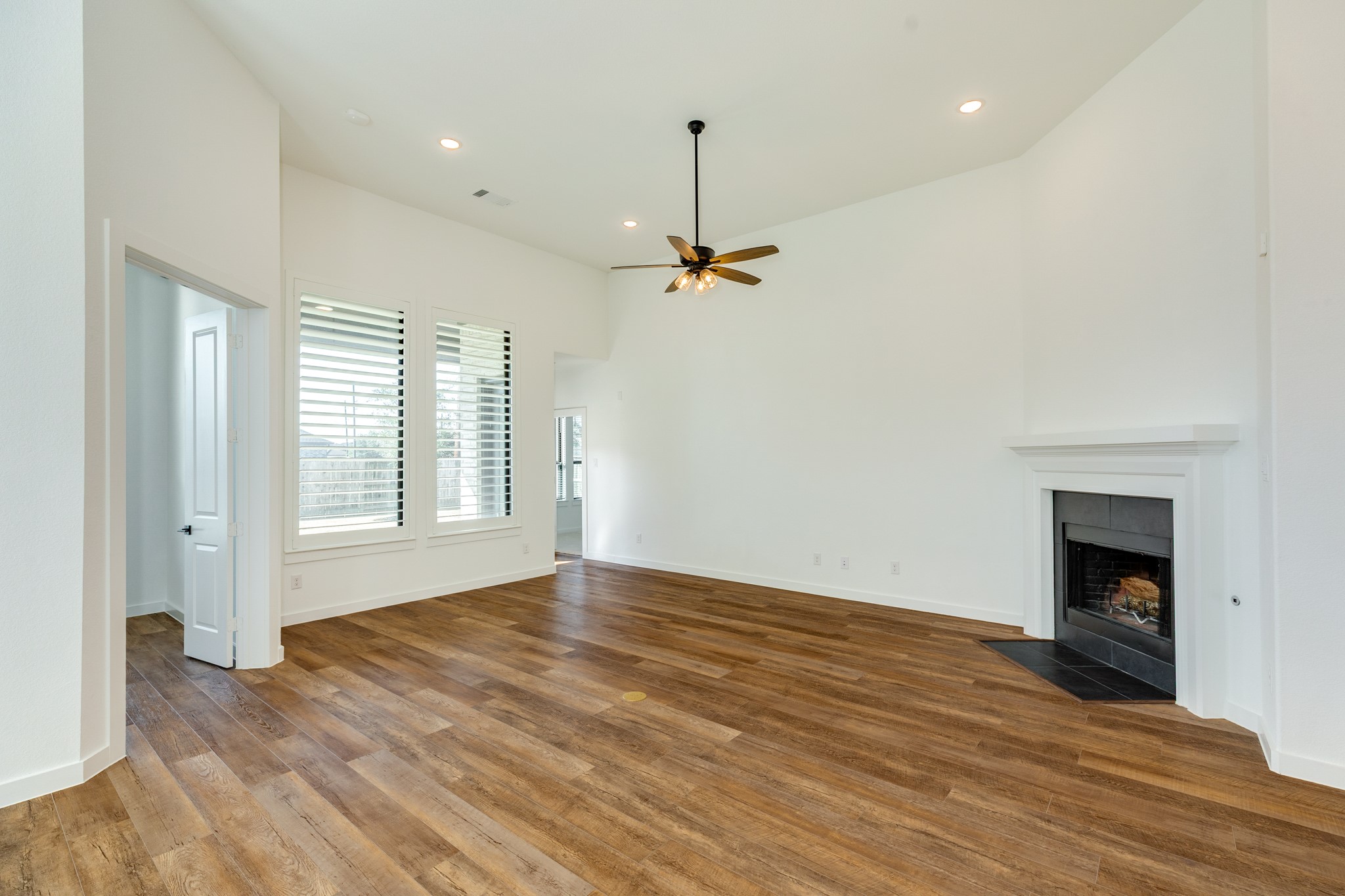 3806 Shackleton Court Rosharon, TX 77583 - Photo 49 of 50 Open Concept Layout: The house boasts an open floor plan. A dedicated office is located on the left.
Entry to the primary bedroom suite is from the family room.