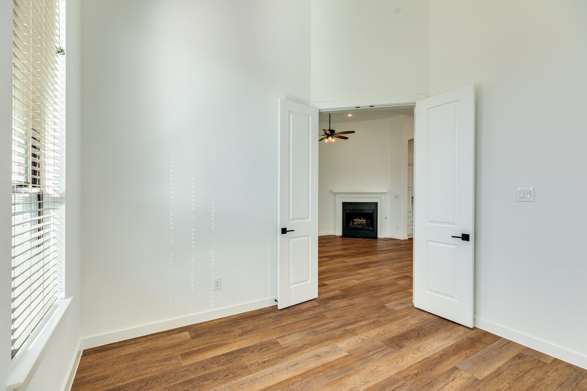3806 Shackleton Court Rosharon, TX 77583 - Photo 23 of 50 From the office, the fireplace offers a calming and soothing view, creating a tranquil ambiance.