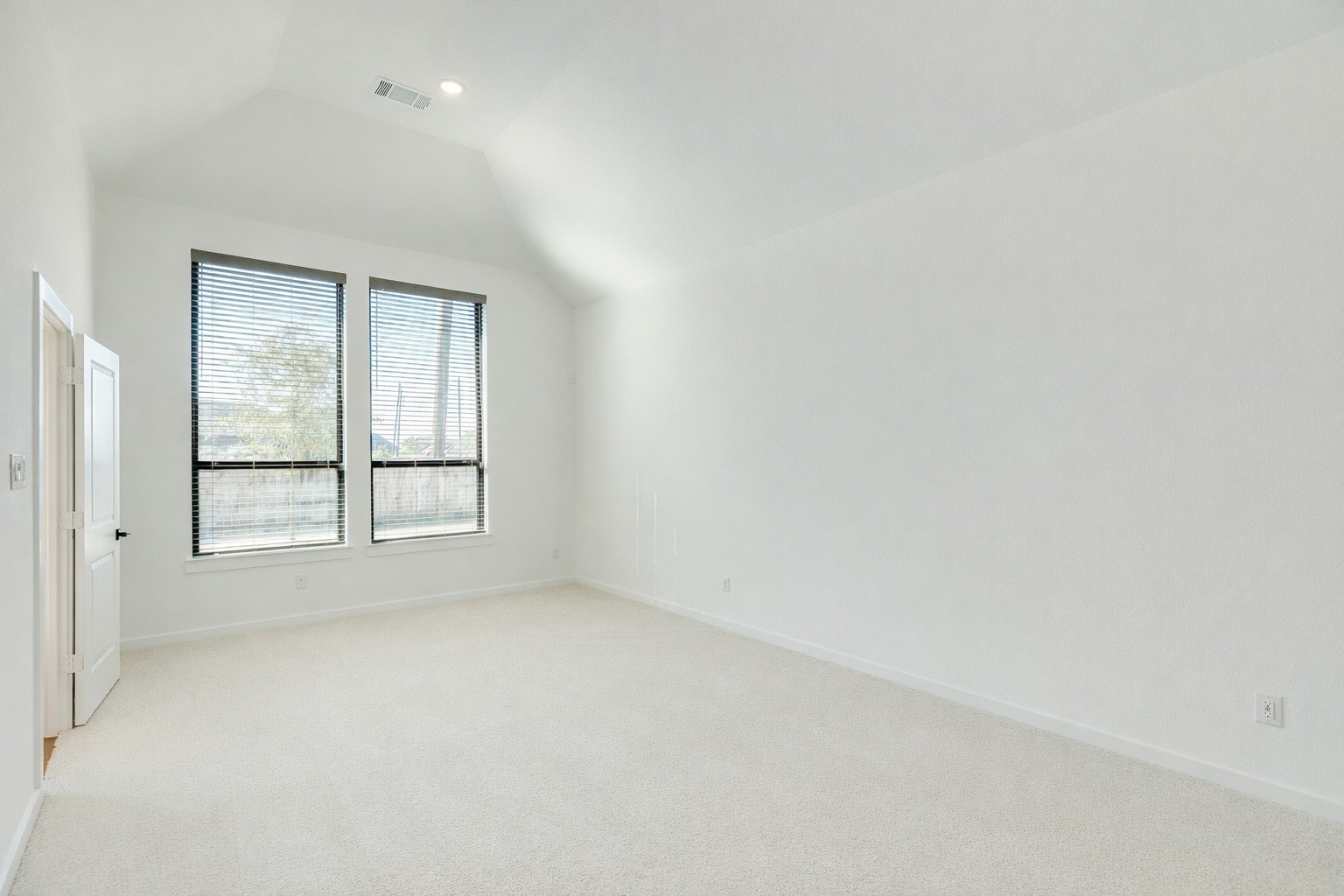 3806 Shackleton Court Rosharon, TX 77583 - Photo 25 of 50 Primary bedroom features oversized double windows with views of the private backyard.