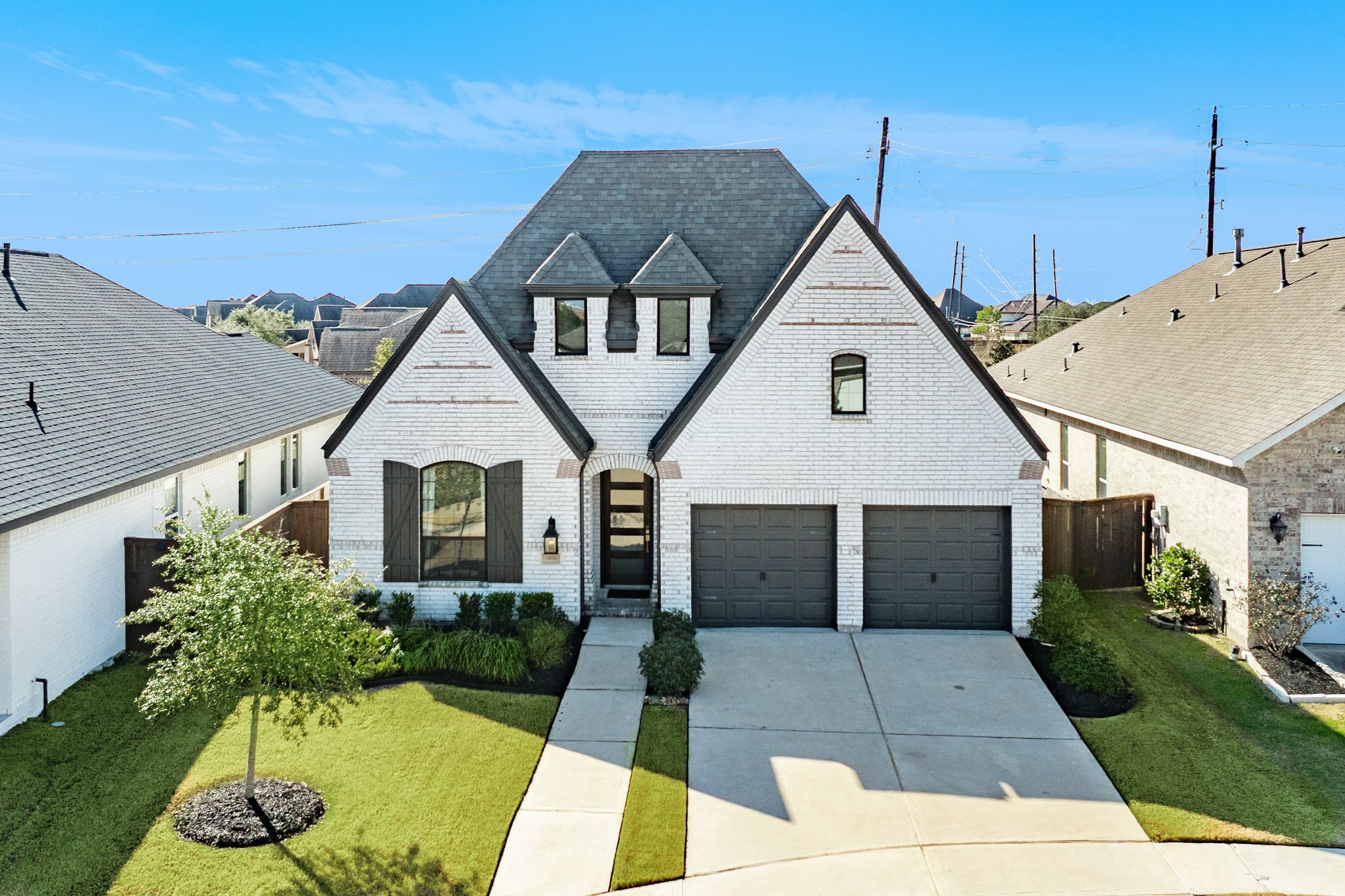 3806 Shackleton Court Rosharon, TX 77583 - Photo 3 of 50 Aerial view of the front of this beautiful home, featuring a 2-car garage and a double driveway.