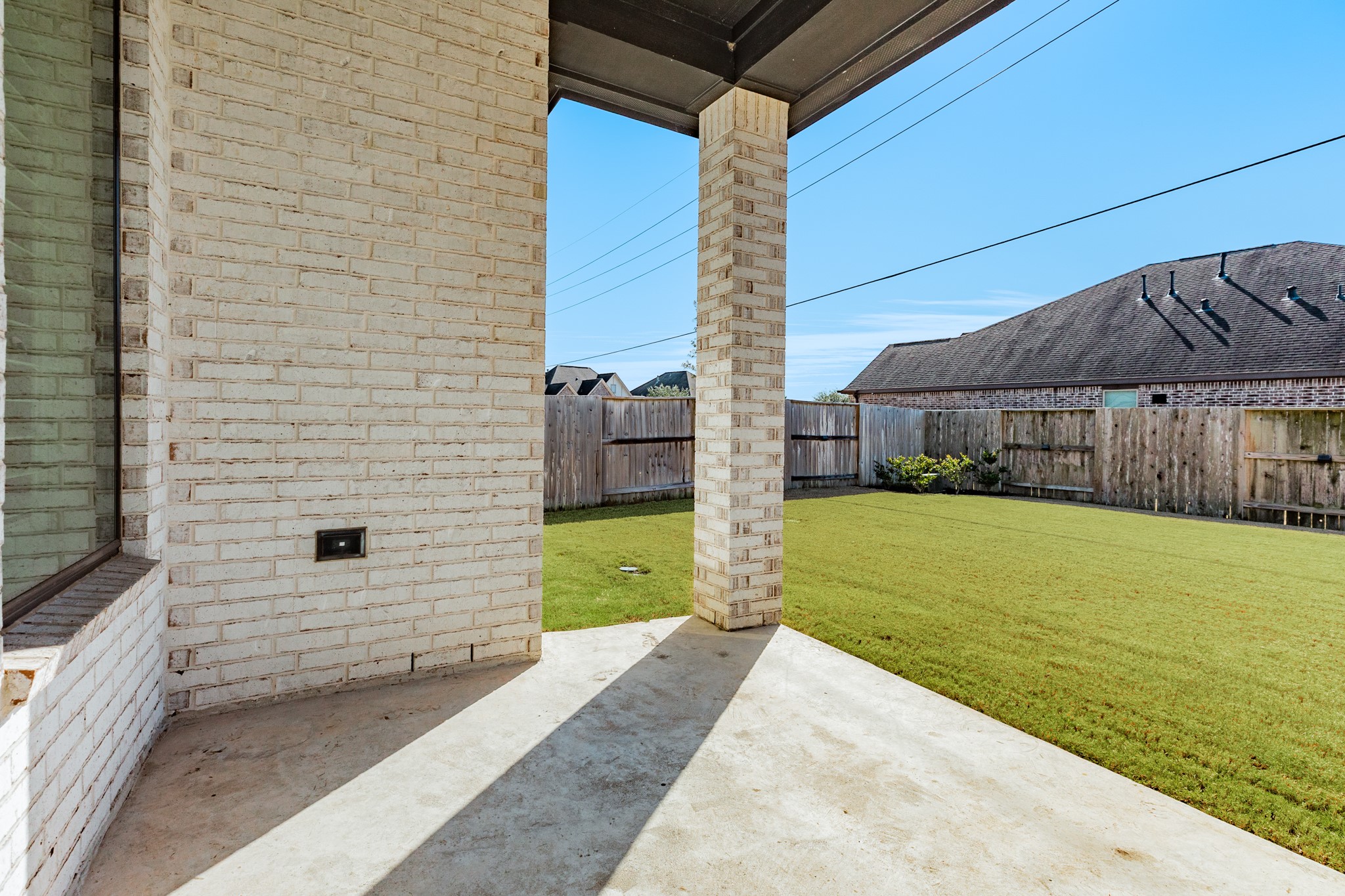 3806 Shackleton Court Rosharon, TX 77583 - Photo 38 of 50 Covered patio with outlets, a great area to relax. It's also a fantastic spot to view the fireworks from the convenience of your own backyard.