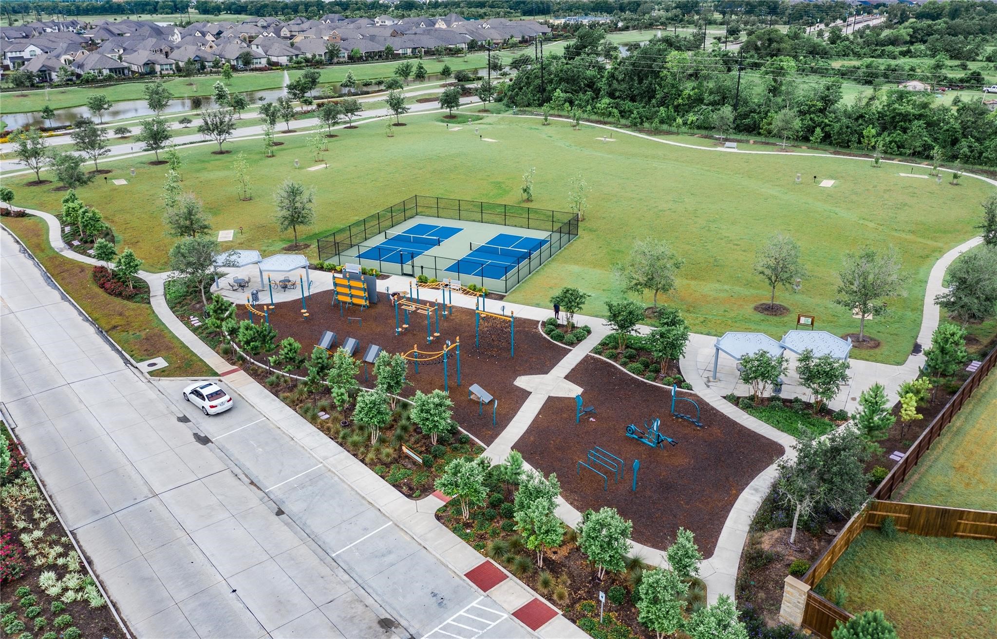 3806 Shackleton Court Rosharon, TX 77583 - Photo 45 of 50 Challenger Park offers outdoor exercise enthusiasts a variety of amenities, including pickleball courts and a disc golf course, all within a pleasant walking trail setting.