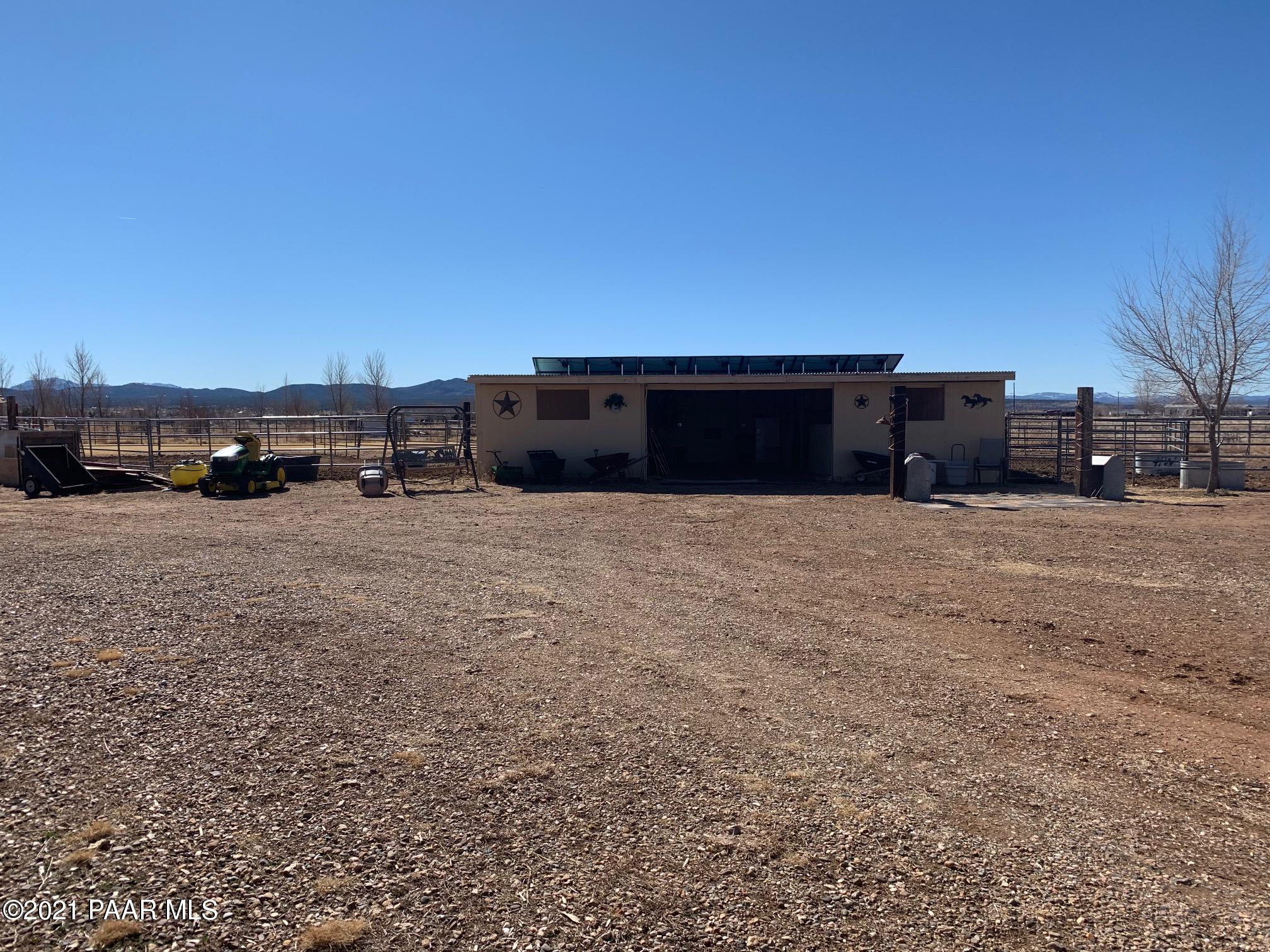 25360 North High Desert Road Paulden, AZ 86334 - Photo 6 of 16 a view of a couch with an outdoor space