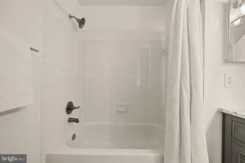 a bathroom with a bathtub
