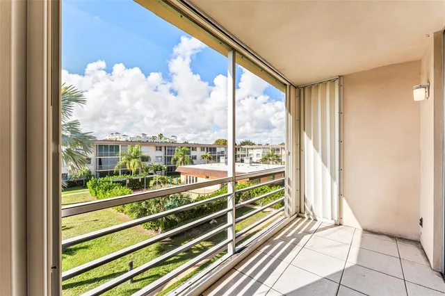 a view of a large window with an outdoor space