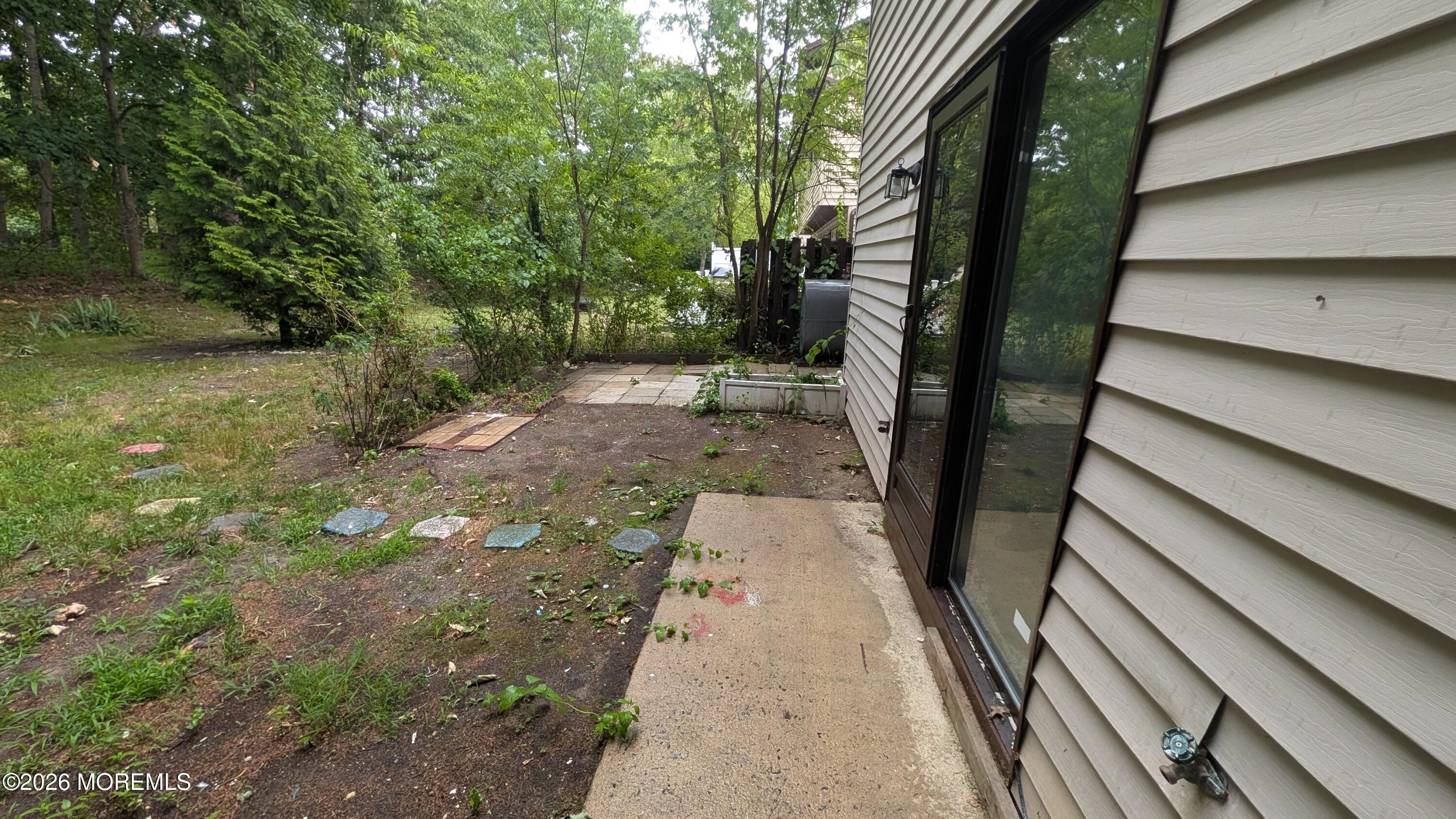 13 Wren Way Howell, NJ 07731 - Photo 24 of 30 Patio Doors off Living Room to Back Yard