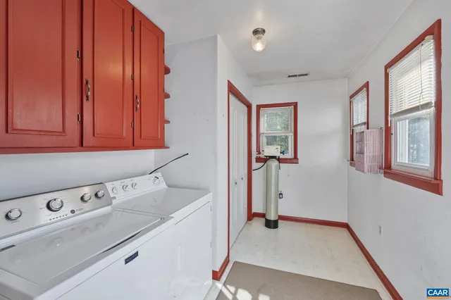 a view of a storage & utility room with utility room
