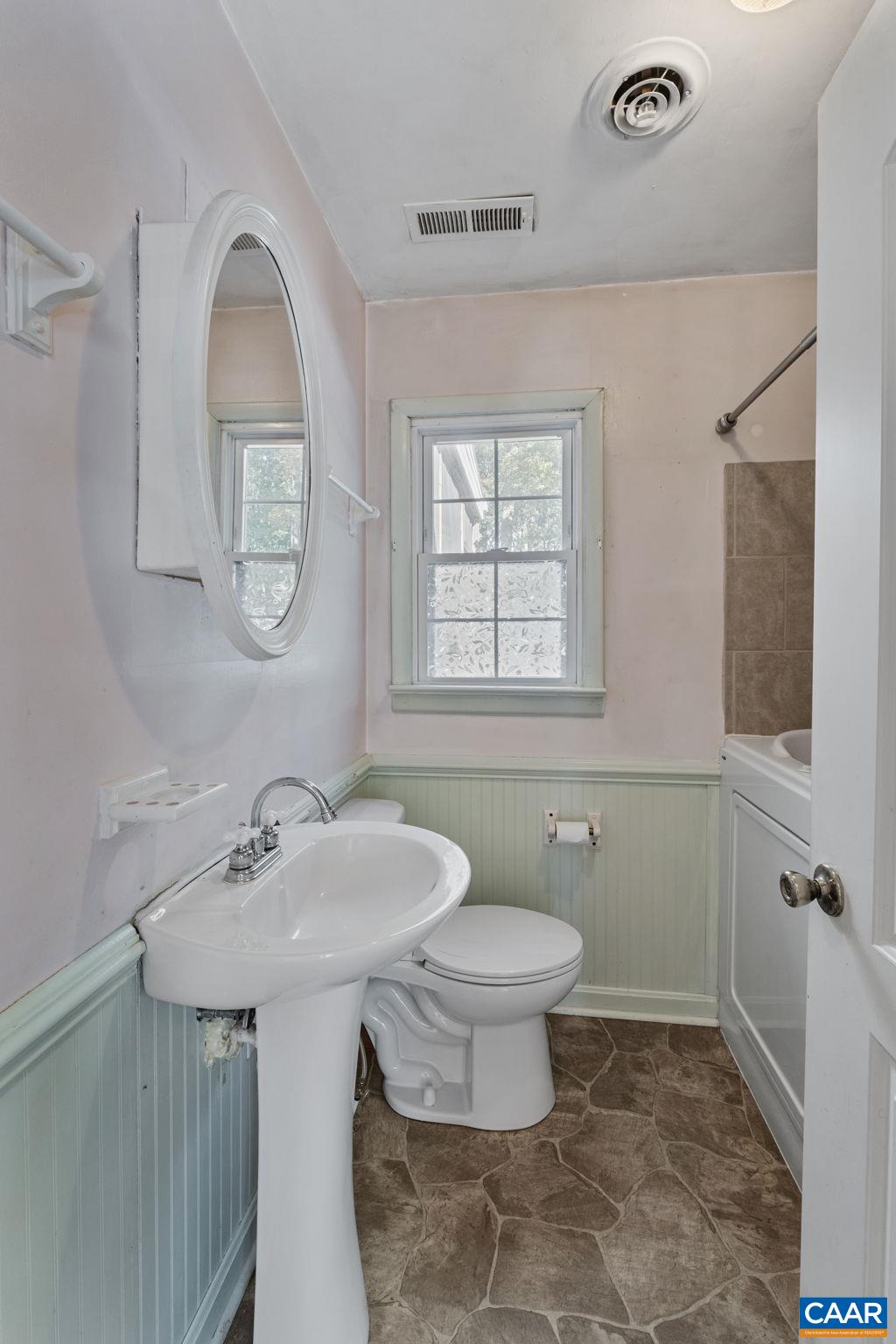 2380 South Constitution Route Dillwyn, VA 23936 - Photo 13 of 41 a bathroom with a sink toilet and window