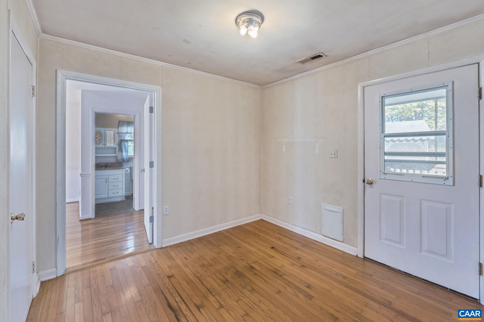 2380 South Constitution Route Dillwyn, VA 23936 - Photo 16 of 41 wooden floor in an empty room with a window