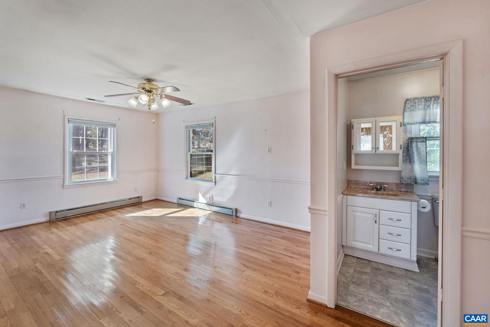 2380 South Constitution Route Dillwyn, VA 23936 - Photo 18 of 41 wooden floor in an empty room with a window