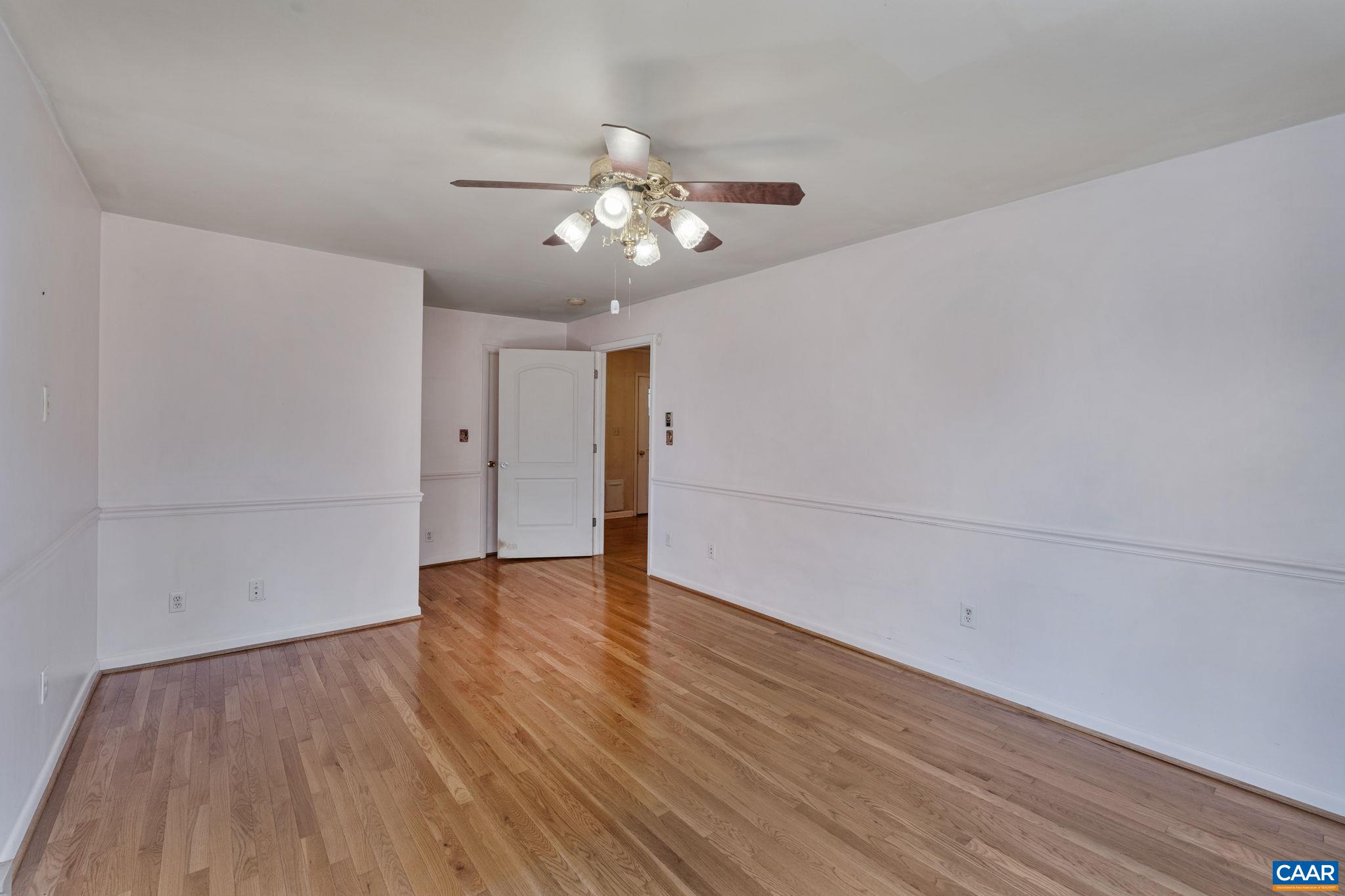 2380 South Constitution Route Dillwyn, VA 23936 - Photo 20 of 41 wooden floor in an empty room with a window