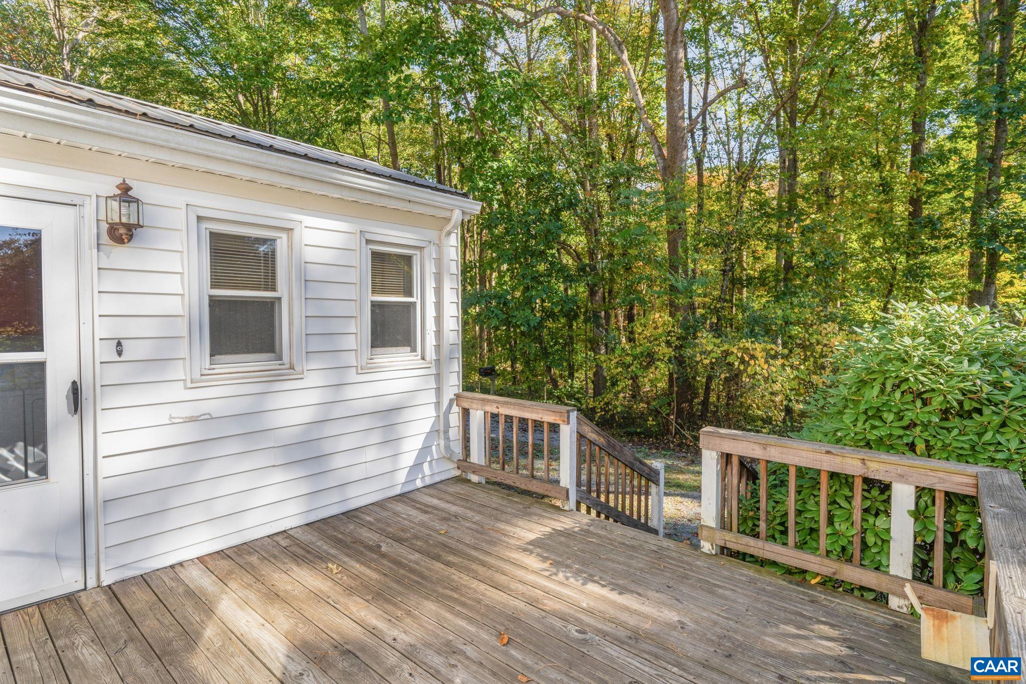 2380 South Constitution Route Dillwyn, VA 23936 - Photo 23 of 41 a view of house with deck and trees
