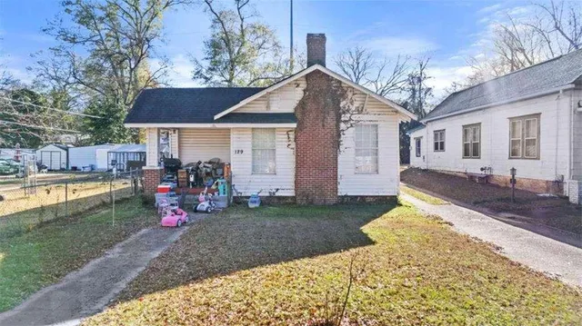 a view of a house with a patio