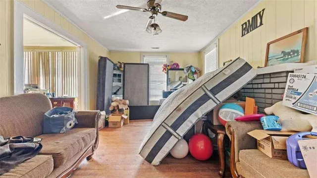 a bedroom with furniture and a chandelier