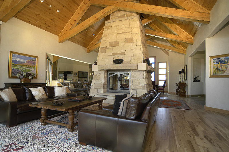 805 Sopris Mountain Ranch Road Basalt, CO 81621 - Photo 17 of 23 a living room with furniture and wooden floor