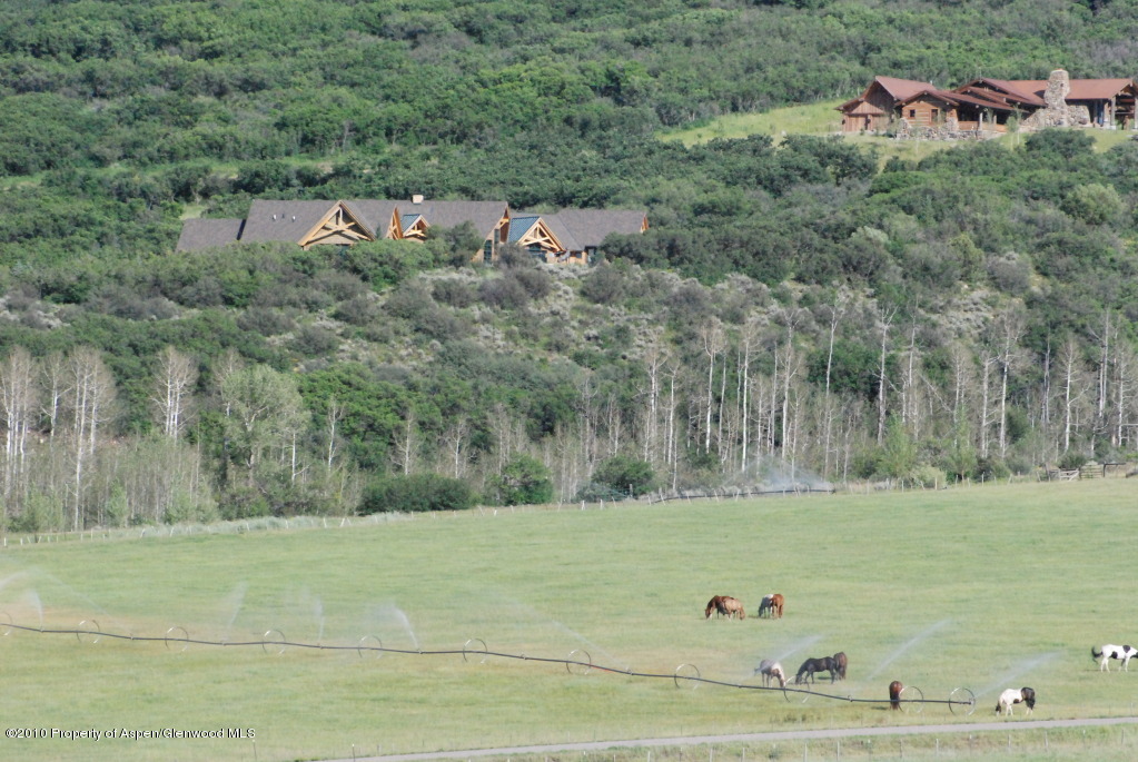 805 Sopris Mountain Ranch Road Basalt, CO 81621 - Photo 20 of 23 a view of a town with barn