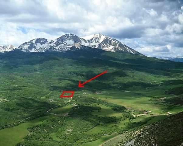 805 Sopris Mountain Ranch Road Basalt, CO 81621 - Photo 21 of 23 a view of an houses with a lush green forest