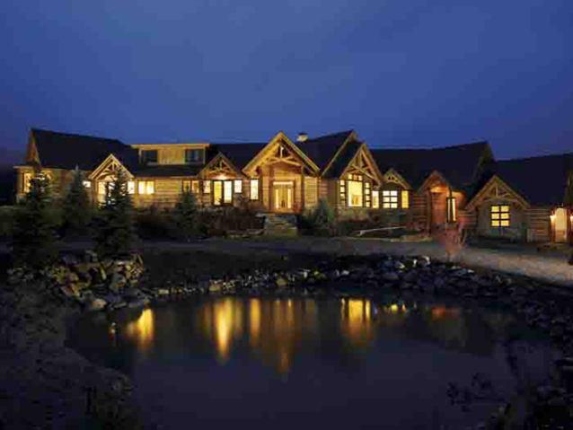 805 Sopris Mountain Ranch Road Basalt, CO 81621 - Photo 7 of 23 a front view of a house with yard swimming pool and outdoor seating
