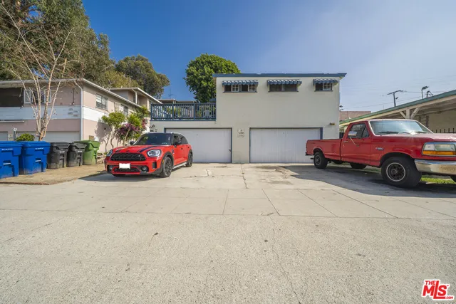a car parked in parking area of a house