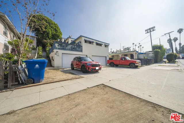 a car parked in front of a house