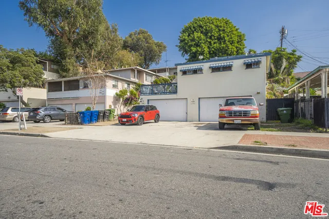 a view of a street with cars