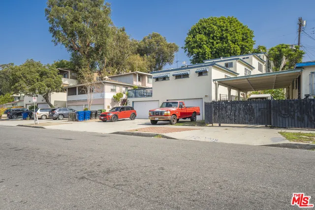 a cars parked in front of a house