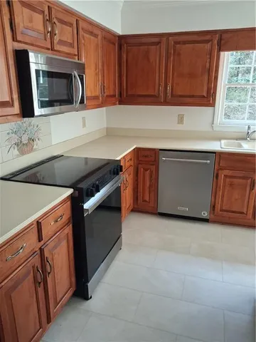 a view of an empty room with windows