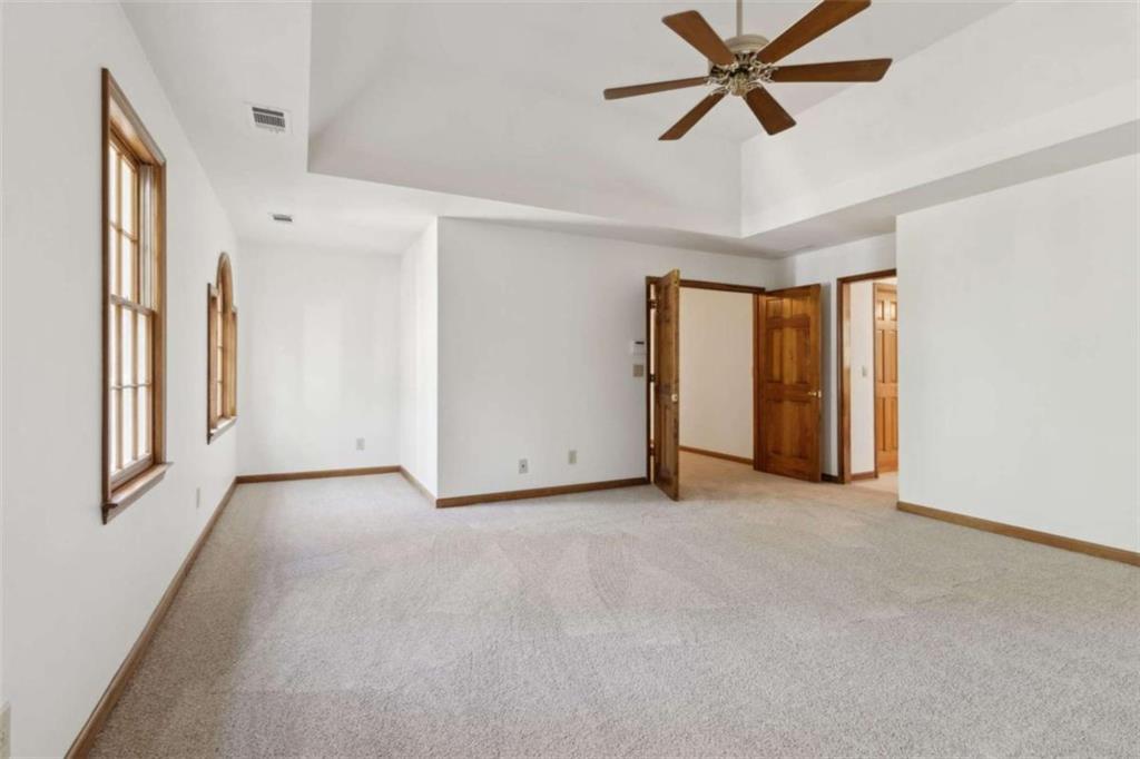 3083 Callie Still Road Lawrenceville, GA 30045 - Photo 37 of 73 a view of an empty room with a window