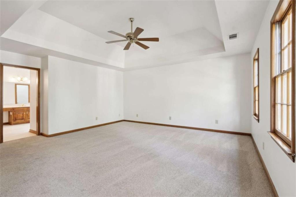 3083 Callie Still Road Lawrenceville, GA 30045 - Photo 39 of 73 a view of an empty room with a window