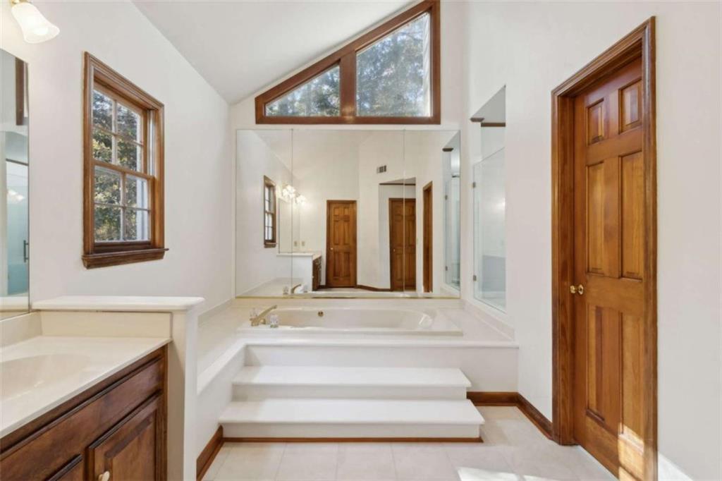 3083 Callie Still Road Lawrenceville, GA 30045 - Photo 42 of 73 a view of an entryway with wooden floor and a front door