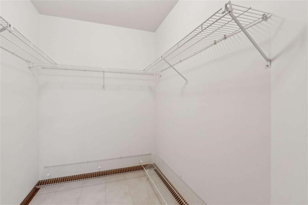 3083 Callie Still Road Lawrenceville, GA 30045 - Photo 44 of 73 a view of a room with racks on the wall