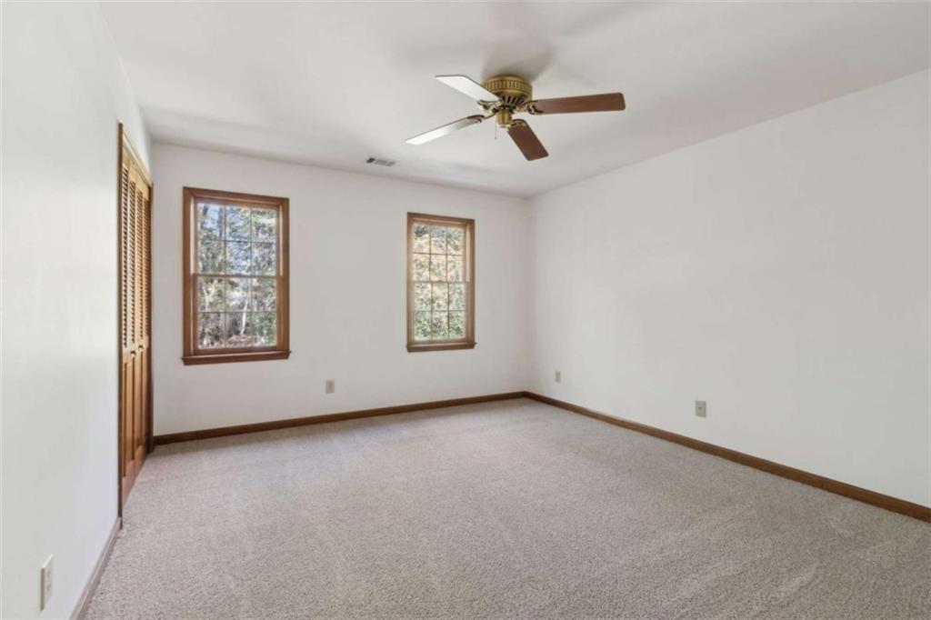3083 Callie Still Road Lawrenceville, GA 30045 - Photo 45 of 73 a view of an empty room with a window