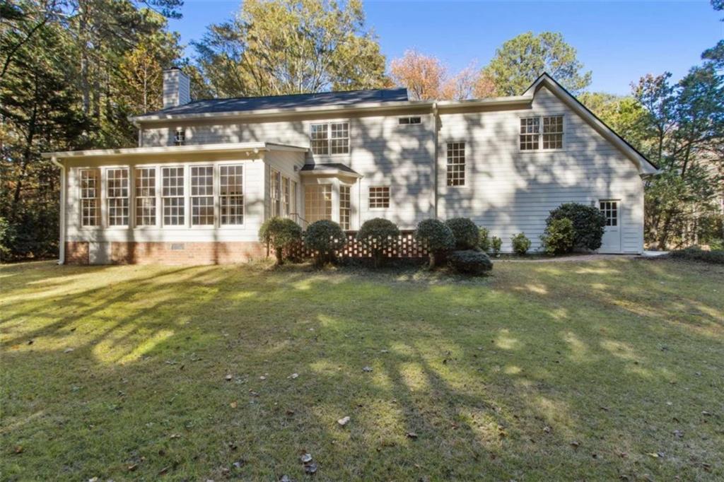 3083 Callie Still Road Lawrenceville, GA 30045 - Photo 58 of 73 a front view of a house with a yard
