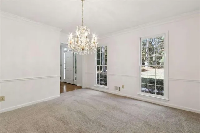 an empty room with windows