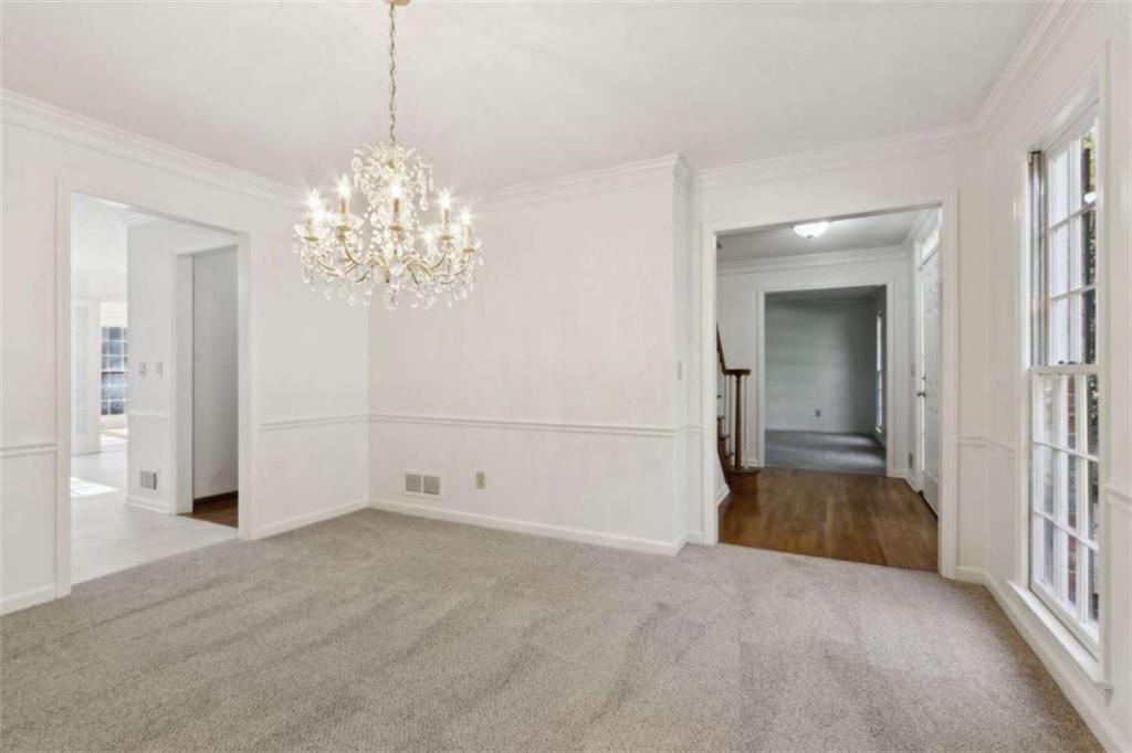 3083 Callie Still Road Lawrenceville, GA 30045 - Photo 10 of 73 a view of a chandelier in big room and chandelier