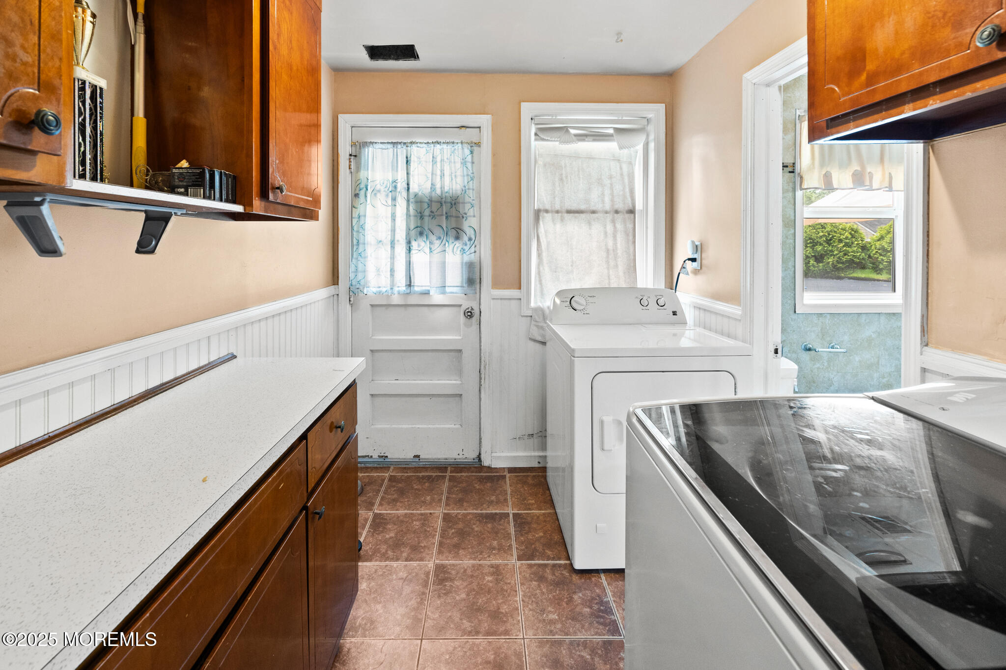 117 Greymoor Road Howell, NJ 07731 - Photo 24 of 32 a kitchen with a sink stove and cabinets