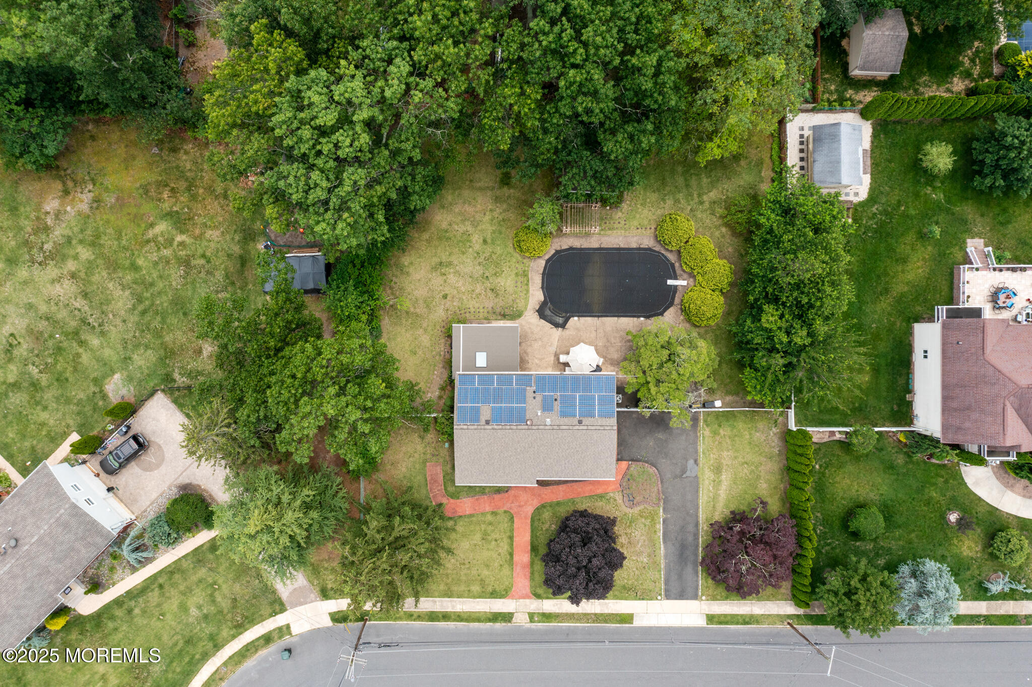 117 Greymoor Road Howell, NJ 07731 - Photo 30 of 32 an aerial view of a house with outdoor space and trees all around