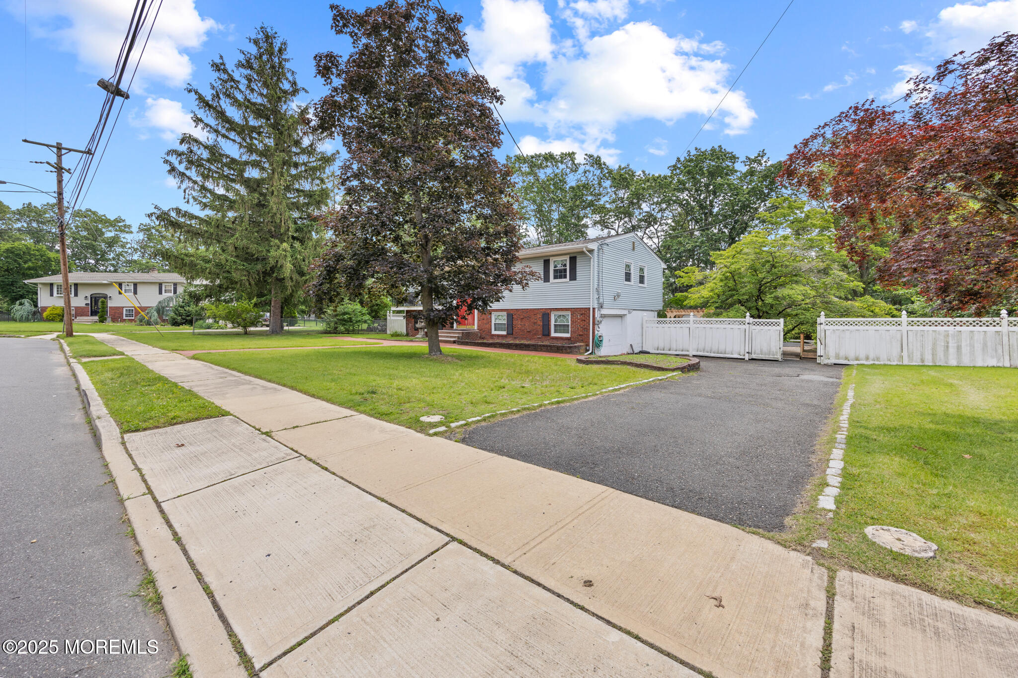 117 Greymoor Road Howell, NJ 07731 - Photo 4 of 32 a view of a house with a yard and large tree
