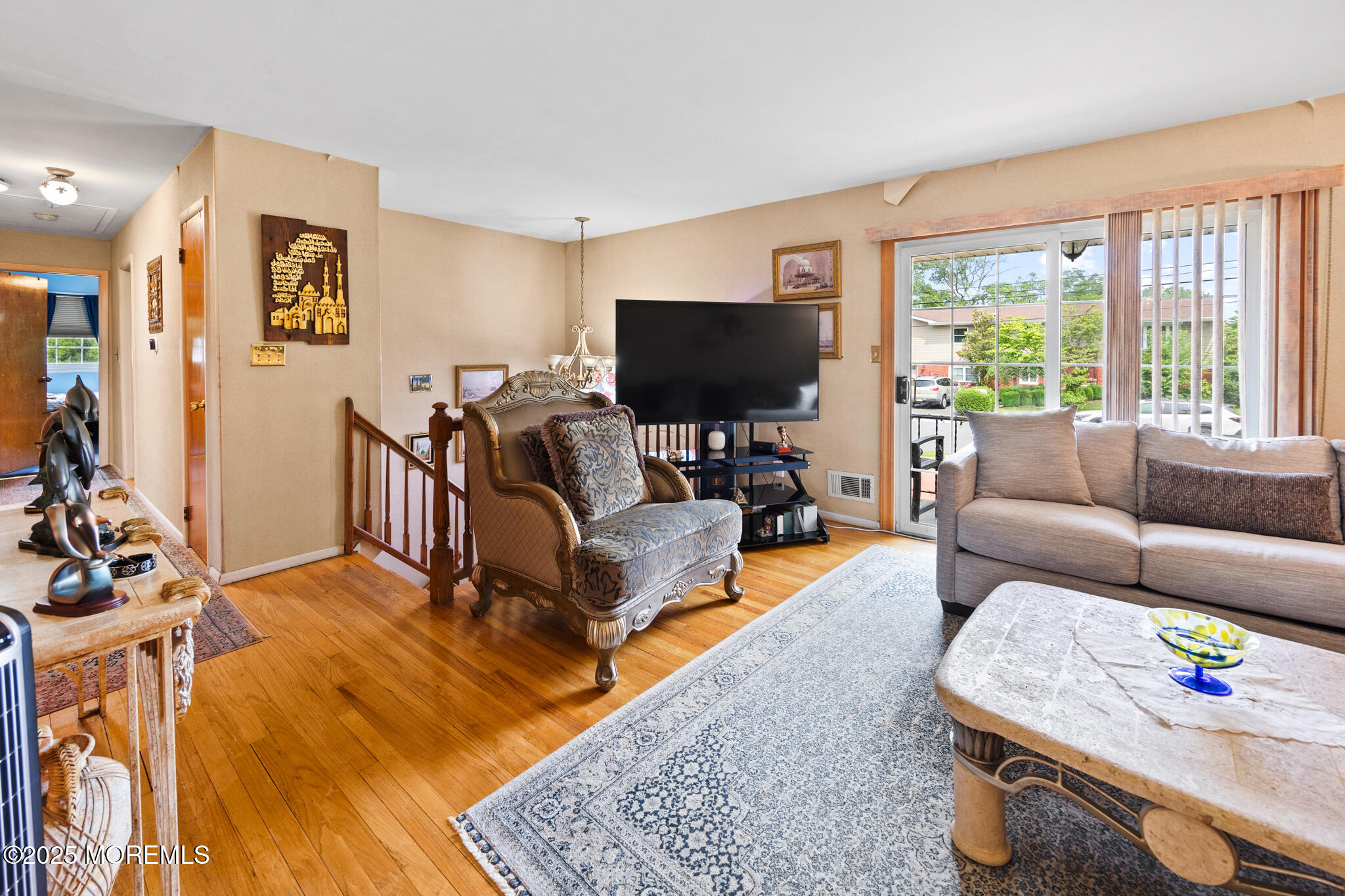 117 Greymoor Road Howell, NJ 07731 - Photo 7 of 32 a living room with furniture and a flat screen tv
