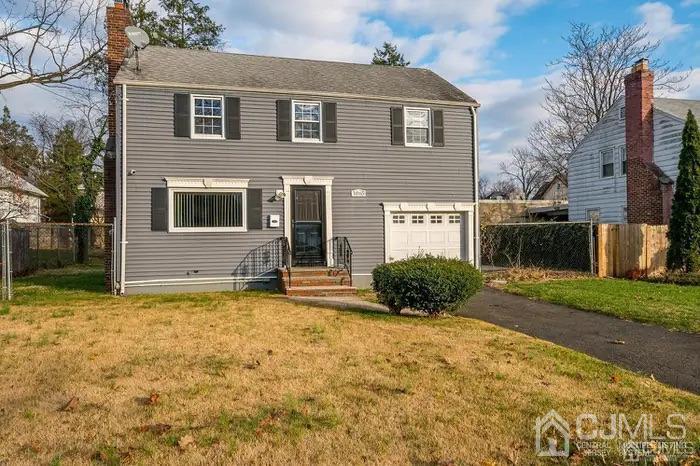 1065-69 Rose Street Plainfield, NJ 07060 - Photo 1 of 5 a view of a house with a yard