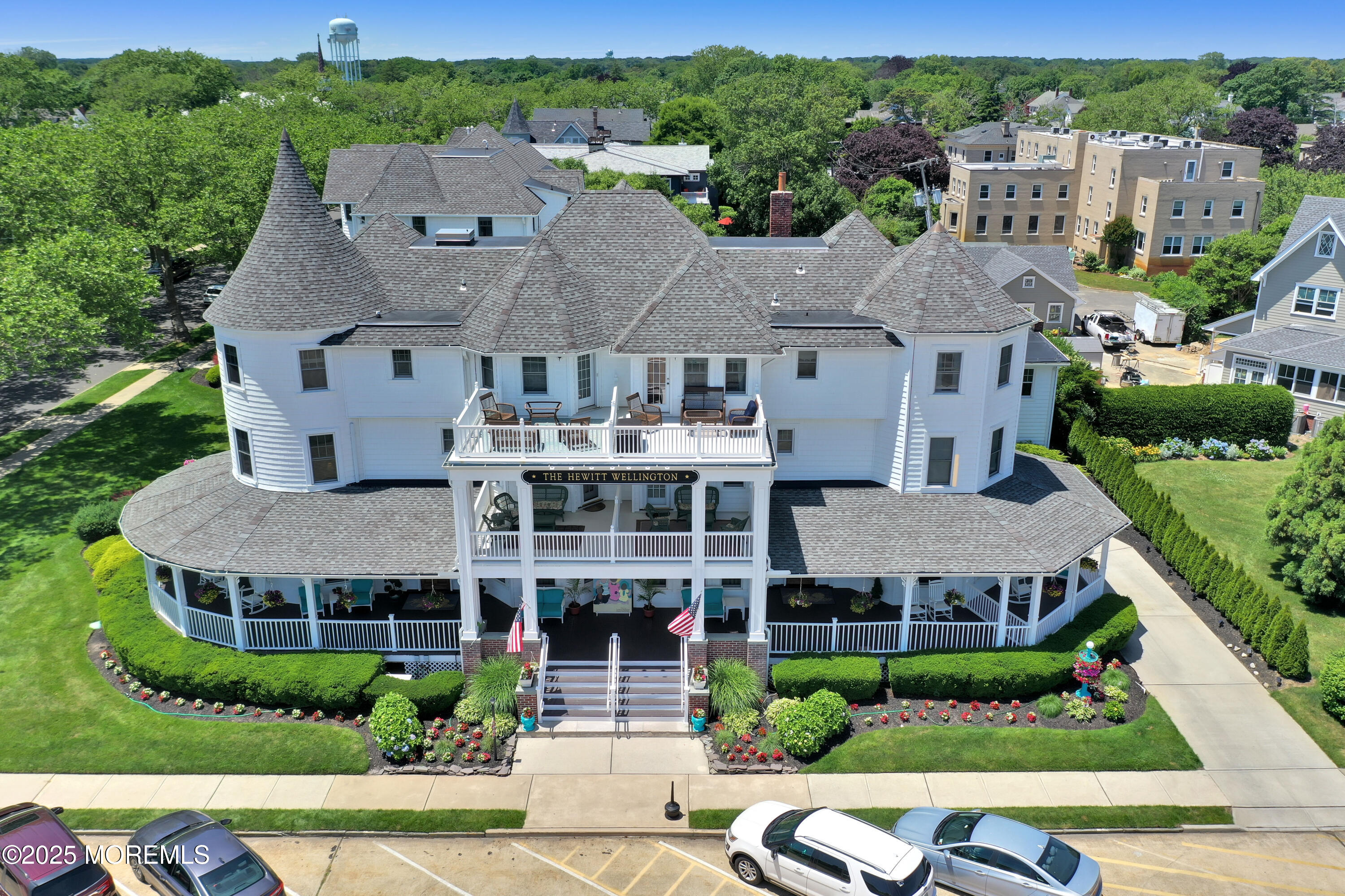 200 Monmouth Avenue, Unit 5 Spring Lake, NJ 07762 - Photo 16 of 26 an aerial view of a house with a garden and plants