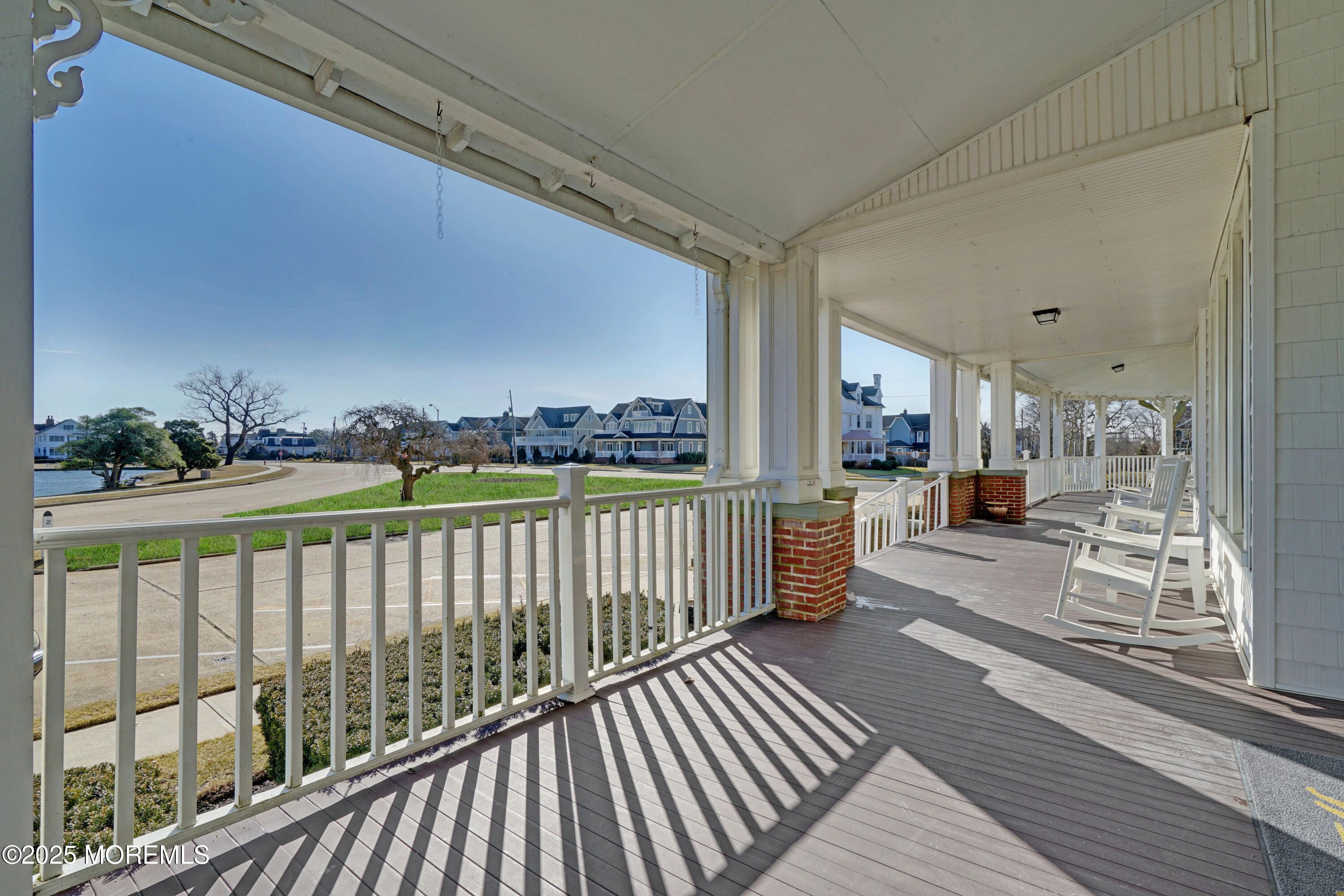 200 Monmouth Avenue, Unit 5 Spring Lake, NJ 07762 - Photo 20 of 26 a view of a balcony with wooden floor