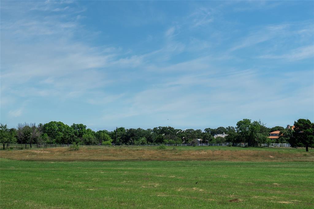 5200 Cross Timbers Road Flower Mound, TX 75028 - Photo 13 of 17 a view of a grassy field with trees
