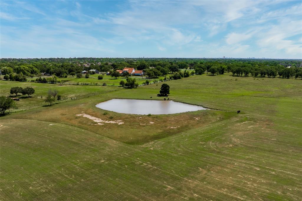 5200 Cross Timbers Road Flower Mound, TX 75028 - Photo 7 of 17 a view of a lake with houses in the background