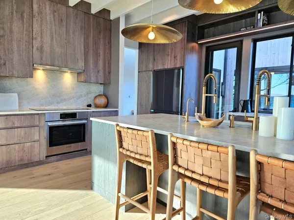 an entryway with wooden floor