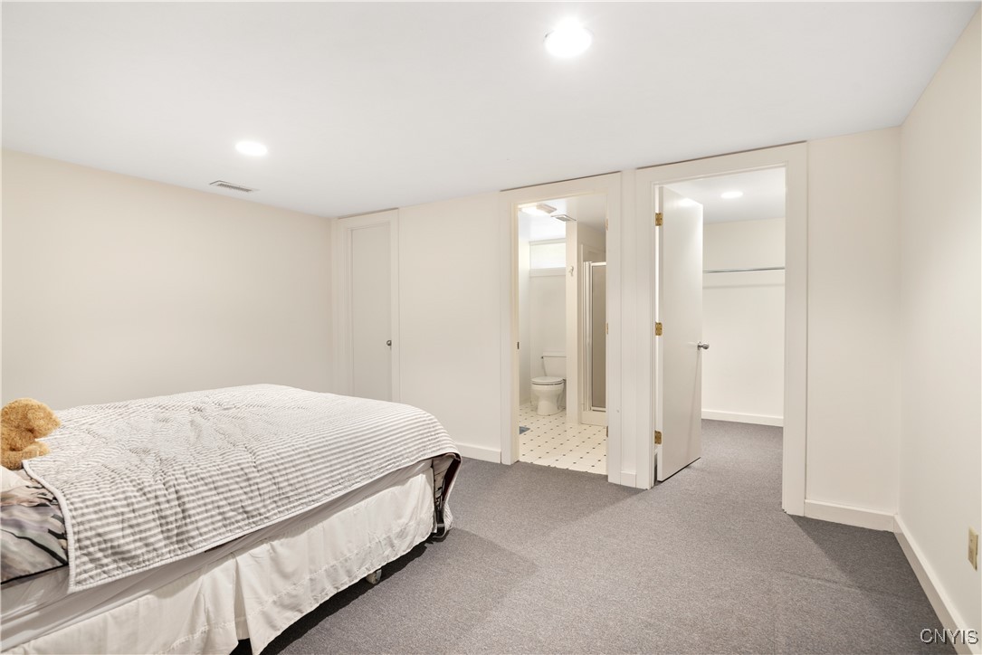 6925 Woodchuck Hill Road De Witt, NY 13066 - Photo 35 of 47 Lower level bedroom on suite