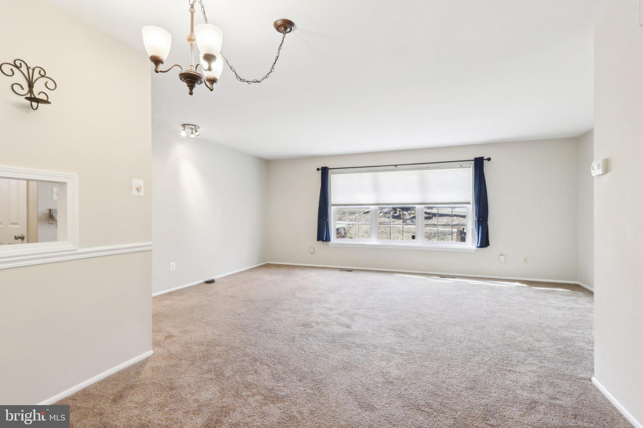 467 Old Forge Crossing Devon, PA 19333 - Photo 11 of 34 an empty room with windows and fan